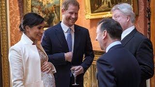 Meghan jokes about her growing bump while Harry hints about baby No. 2 at Palace today
